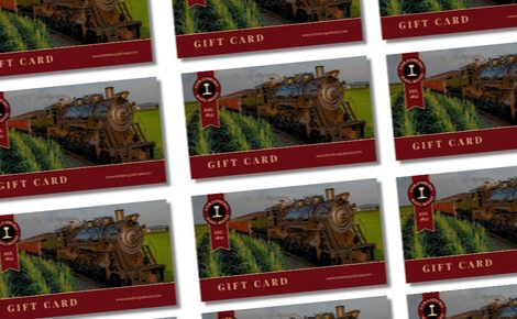 A grid-style layout features identical Strasburg Rail Road gift cards arranged in neat rows. Each card prominently showcases a vintage steam locomotive chugging through a green field, accented by a deep burgundy border at the bottom with "GIFT CARD" in elegant gold serif lettering.