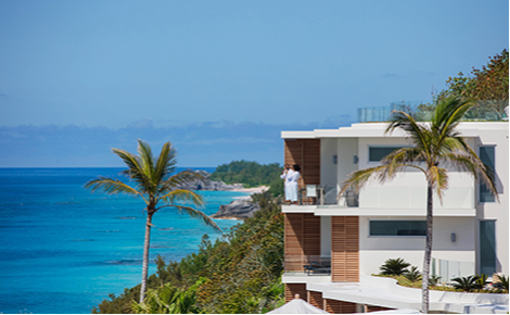 eGift card image of a couple enjoying the view from their room balcony 