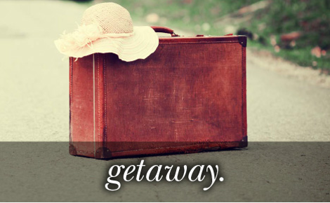 eGift card image of a red suitcase wit the text 