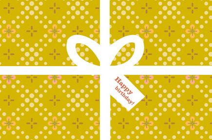 Image of gold gift with white ribbon