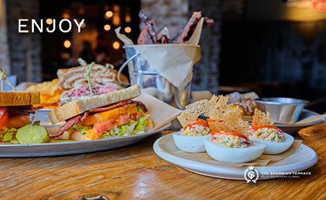 eGift Card image of restaurant dishes with the text “Enjoy” and The Georgian Terrace logo