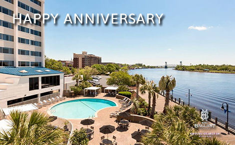 eGift Card image of the hotel pool with the text “Happy Anniversary” and the Hotel Ballast logo