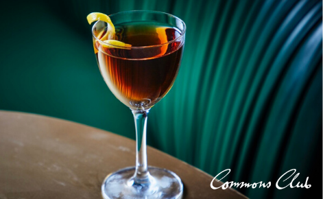 Gift card image of cocktail with the Commons Club logo