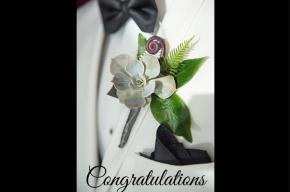 Image of lapel flowers with the text 