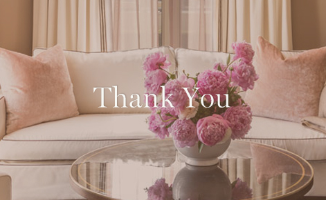 Gift card image of some flowers on a table with the text “Thank You”