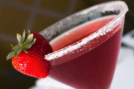 Image of red cocktail with a strawberry