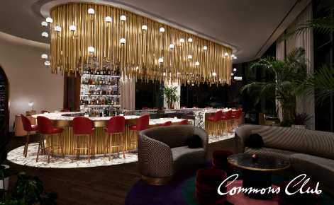 Gift card image of restaurant with the Commons Club logo