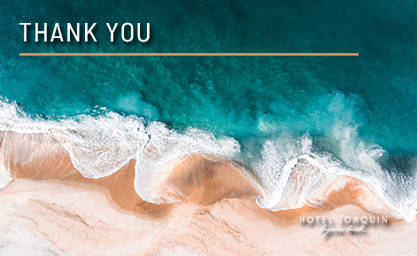 Ariel image of the beach and sea with the text 