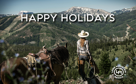 Image of a cowgirl with her horse looking out across the mountains with the text 