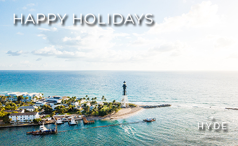 eGift Card image of the lighthouse and the text “Happy Holidays” and the Hyde Beach House logo