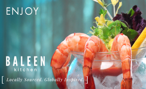 Gift card image of seafood from the restaurant with the text “Enjoy” and the Baleen logo