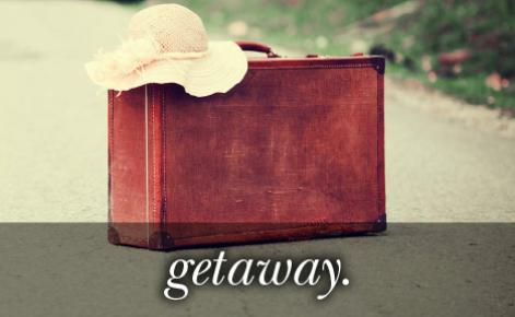 Image of a red suitcase wit the text 