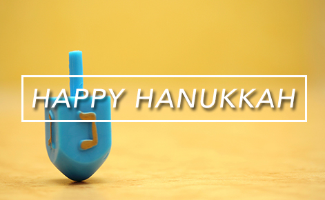 Gift card image of a Dreidel with the text 