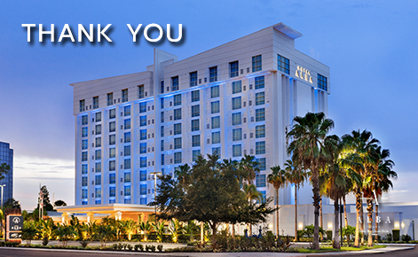eGift Card image of exterior shot of the front of the hotel at dusk with the text “Thank You” and the Hotel Alba logo