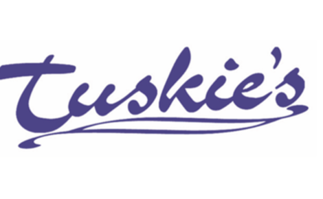 purple cursive logo