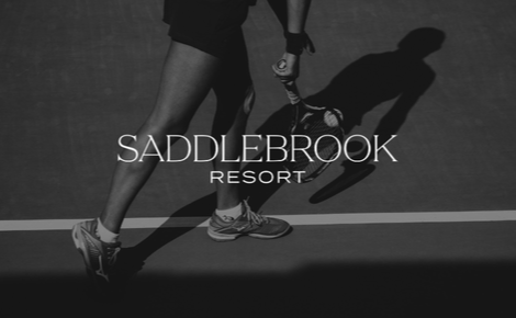 eGift card image with the the Saddlebrook logo and a tennis player