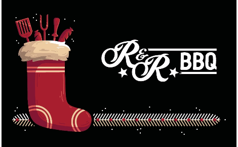 christmas stocking with bbq tools in it