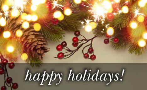 Image of Christmas tree lights and holly with the text 