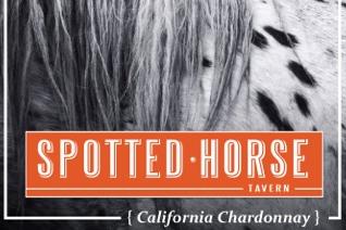 Close up image of a horse with the Spotted Horse logo