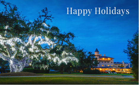 eGift card image of the resort and grounds at night with the text “Happy Holidays”