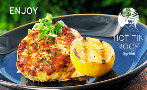Gift card image of a dish from the restaurant with the text “Enjoy” and the Hot Tin Roof logo