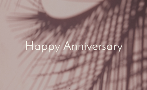 Gift card image of the shadow of a plant with the text “Happy Anniversary” 