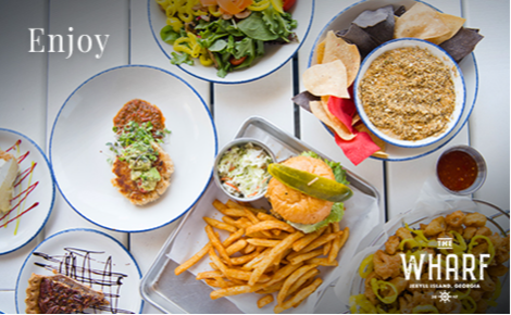 eGift card image of various dishes from the restaurant with the text “Enjoy” and the Wharf restaurant logo