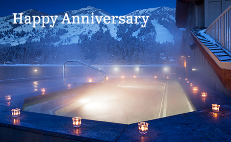 Gift card image of hot tub at night with the text “Happy  Anniversary”