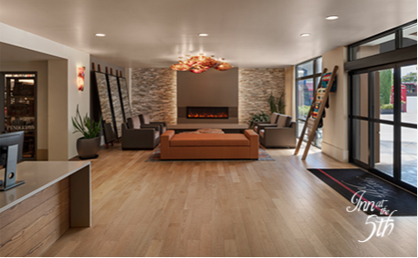 eGift card image of the seating area at the hotel and the Inn at the 5th logo