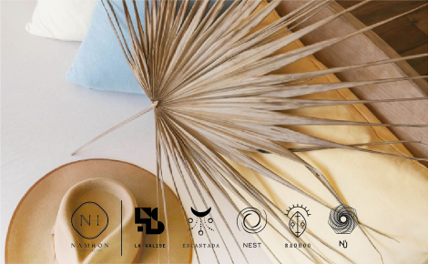 eGift card image of a sun hat and dried palm leaf 