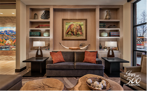 eGift card image of the seating area at the hotel and the Inn at 500 Capitol logo