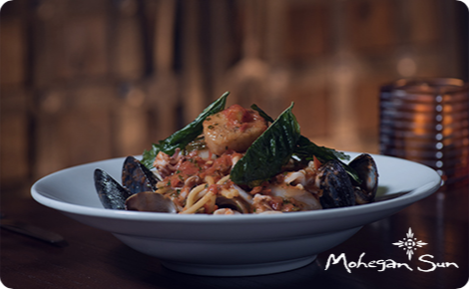 eGift card image of a restaurant dish with the Mohegan Sun logo