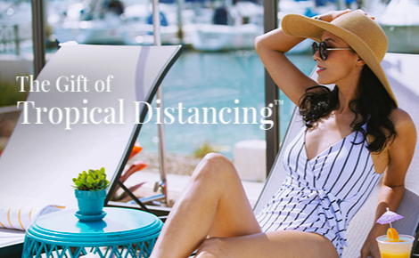 Gift card image of lady on sun lounger with the text 