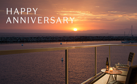 Gift card image of view from room balcony at sunset with the text “Happy Anniversary” 