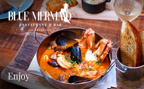 Gift card image of sea food dish with the text “Enjoy” and the Blue Mermaid logo