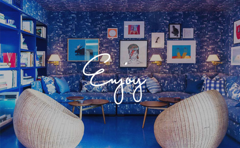 Gift card image of seated area with the text “Enjoy”