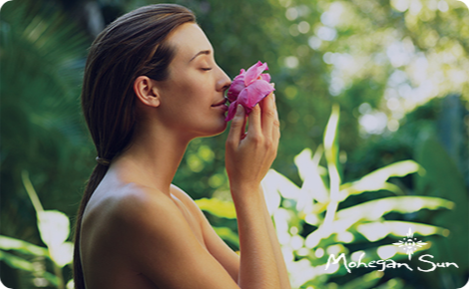 eGift card image of lady smelling a flower and the Mohegan Sun logo