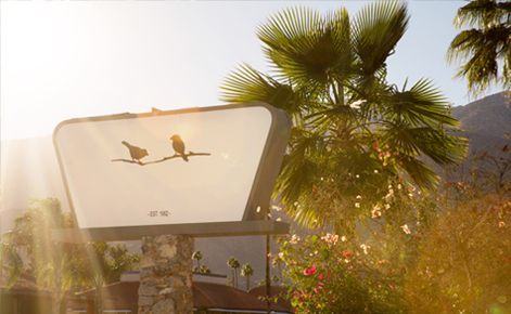 Gift card image of the Sparrows Lodge sign outside of the hotel