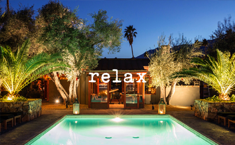 Gift card image of the pool at night with the text “Relax”