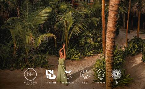 eGift card image of a guest stretching in the sunlight under the palm trees