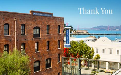 Gift card image of exterior of hotel with the bay in the background and the text “Thank You”
