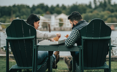 Gift card image of couple eating outside