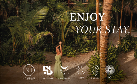 eGift card image of a guest stretching in the sunlight under palm trees 