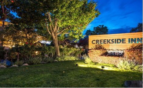 eGift card image of the Creekside Inn sign at night 