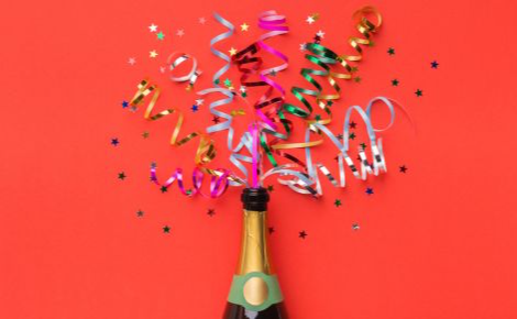 eGift card image of a Champaign bottle with confetti flying out 
