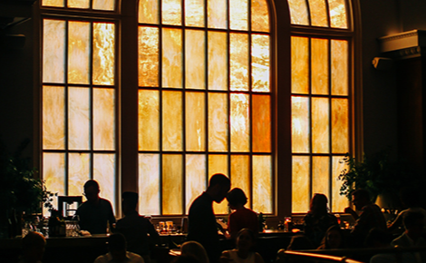 eGift card image of diners at the Line DC Restaurant