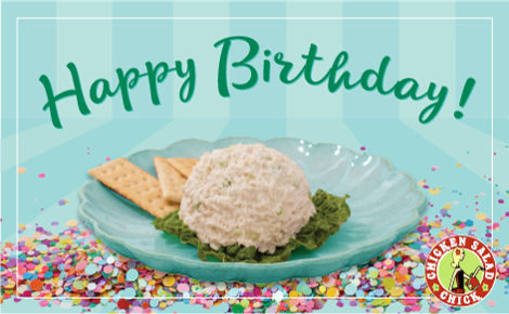 Happy birthday with confetti and scoop of Chicken Salad on plate