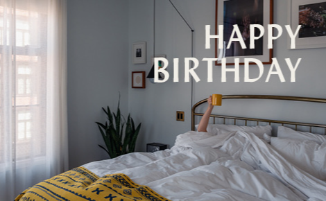 eGift card image of a hotel suite with the text 